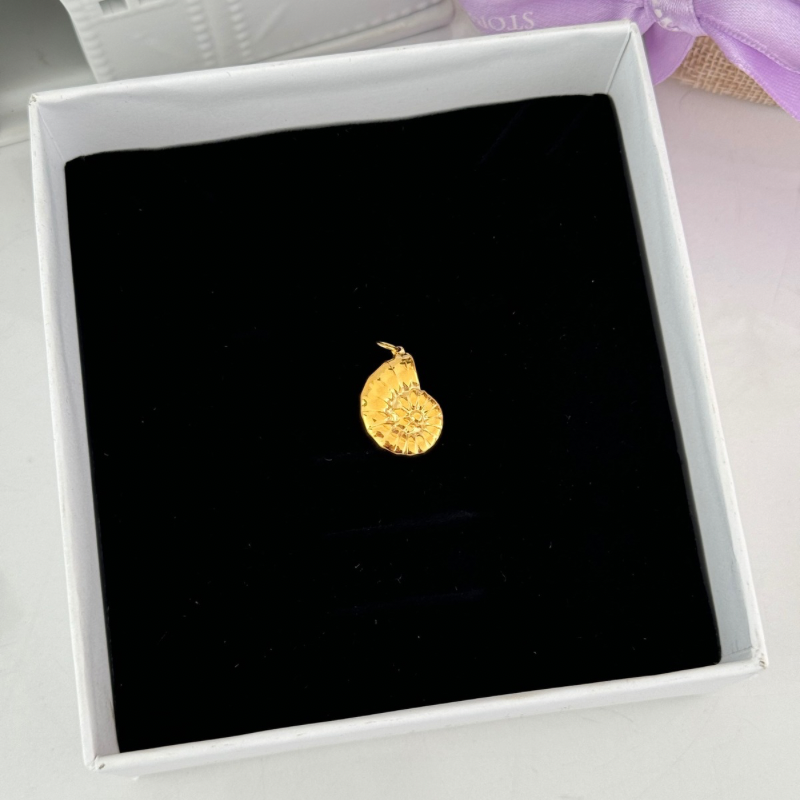 Ram's horn shell charm