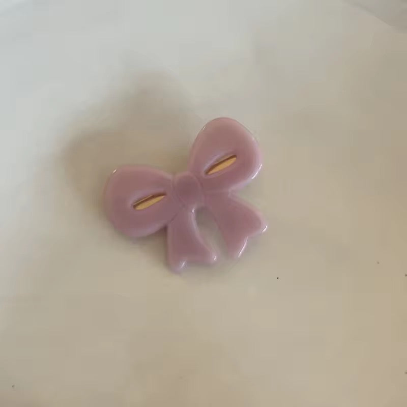 Resin bow clip