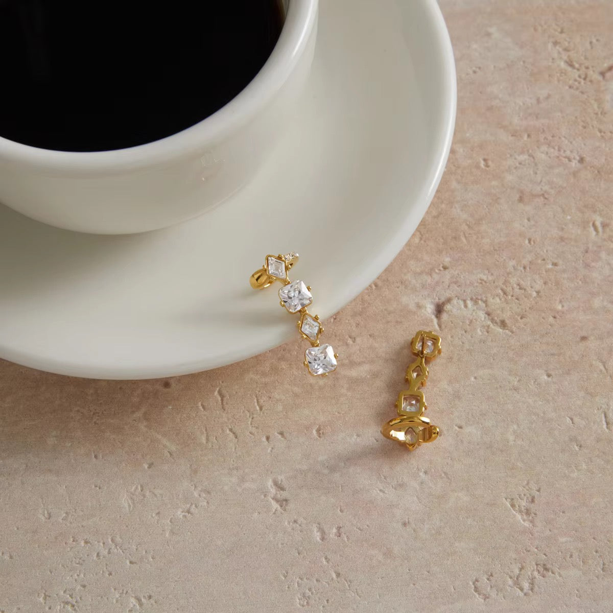 Pataka cuff earrings
