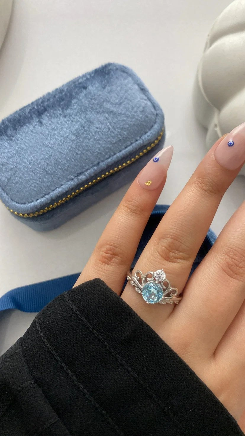 Blue princess cut ring