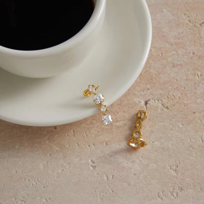 Pataka cuff earrings
