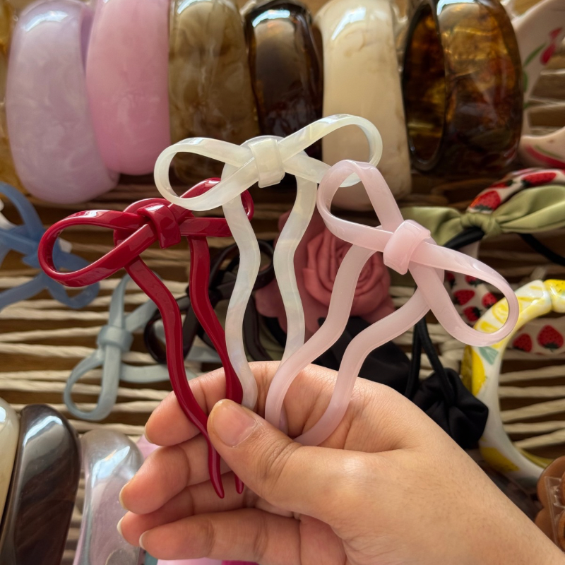 Bow hair stick